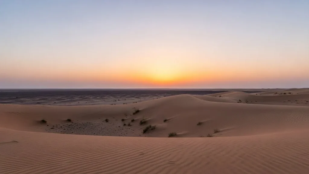 Empty flat sand plateau in Dubai desert during calm sunset, peaceful scenery